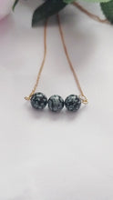 Load and play video in Gallery viewer, Snowflake Obsidian Yellow Gold Vermeil Necklace, Snowflake Obsidian Bar Necklace, Gemstone Bar Necklace, Pendant Necklace | by nlanlaVictory