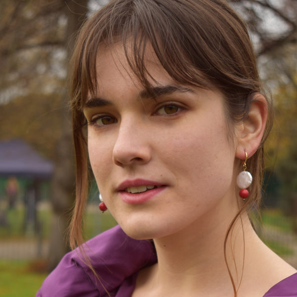 Coin freshwater pearl huggie earrings with red coral bead | by Ifemi Jewels