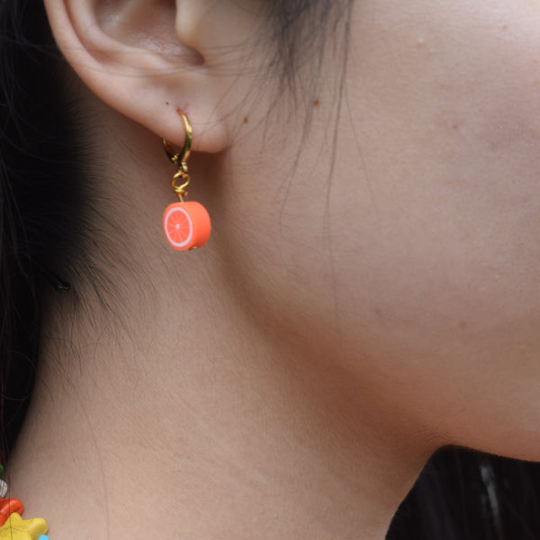 Orange Huggie Earrings | by Ifemi Jewels